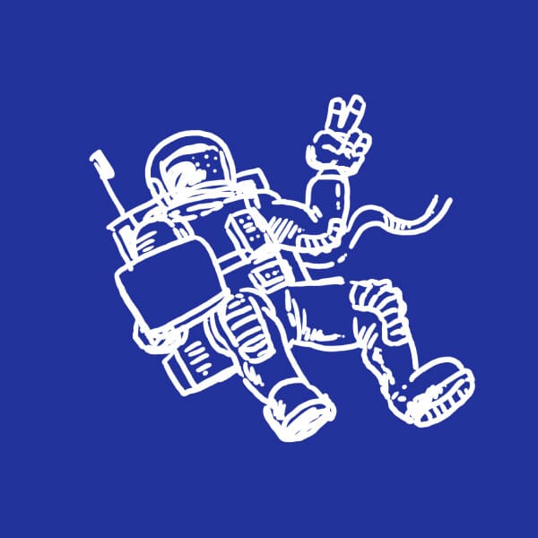 An astronaut floating in space giving the peace sign while working on his laptop.