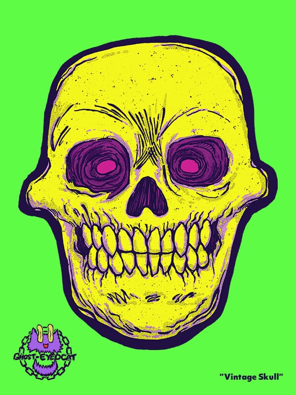 A vintage Halloween skul with dayglow magenta eyes stares with jaws clenched at the viewer with it's terrifying gaze!