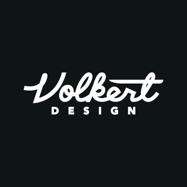 Volkert Design streamline script in white on brand red.,Alternate looks for fills for the main Volkert Design script.,Volkert Design script in a variety of flag colors.,Volkert Design script in a variety of solid color pennants.,Volkert Design script in a waving single black pennant.,Volkert Design script in a waving gray pennant.,Volkert Design blackletter V variations.,Volkert Design favicon designs.