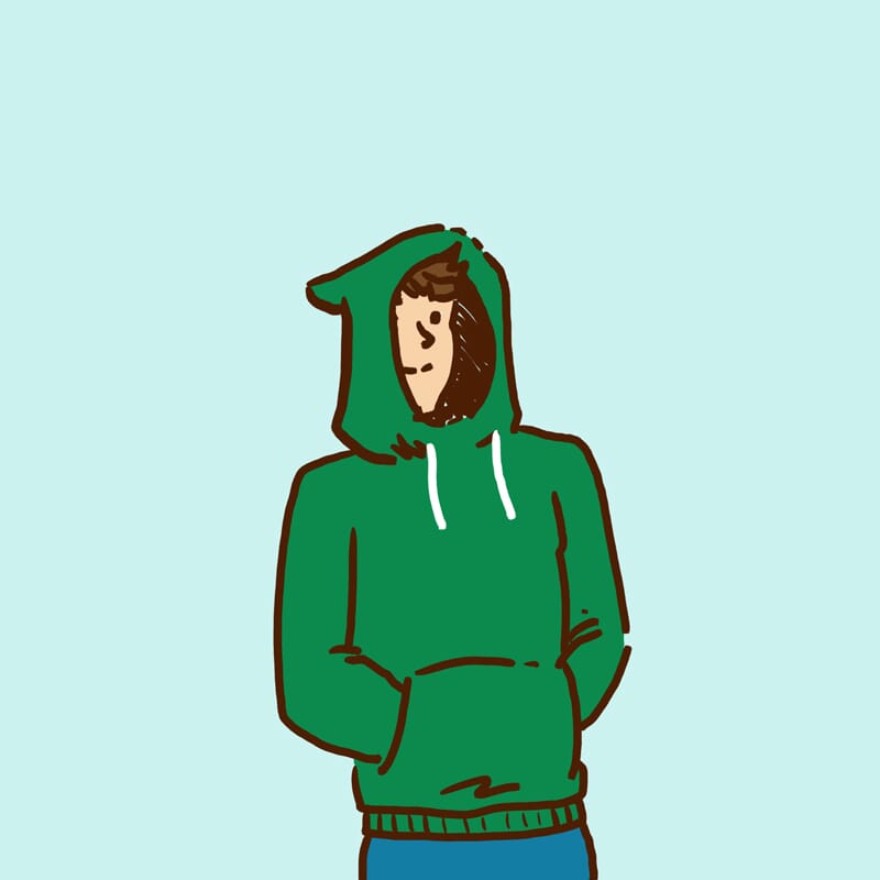 A young man disappears into a hooded sweatshirt with the hood up.