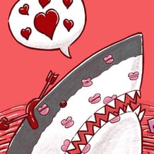 A shark peeks out of the water covered in kisses and wearing an arrow through its head headpiece.